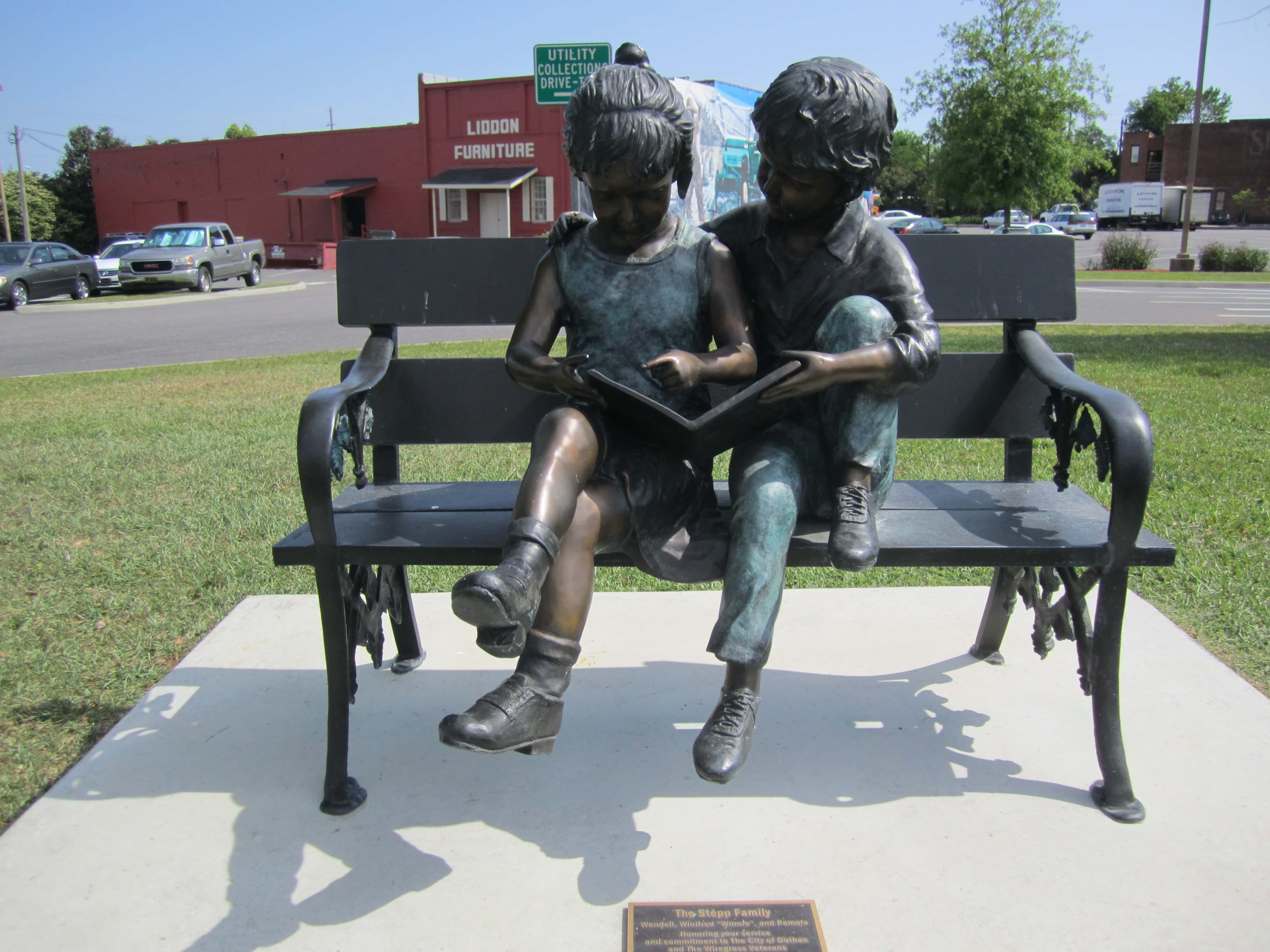 Statue Kids On Bench Reading, Dothan, AL