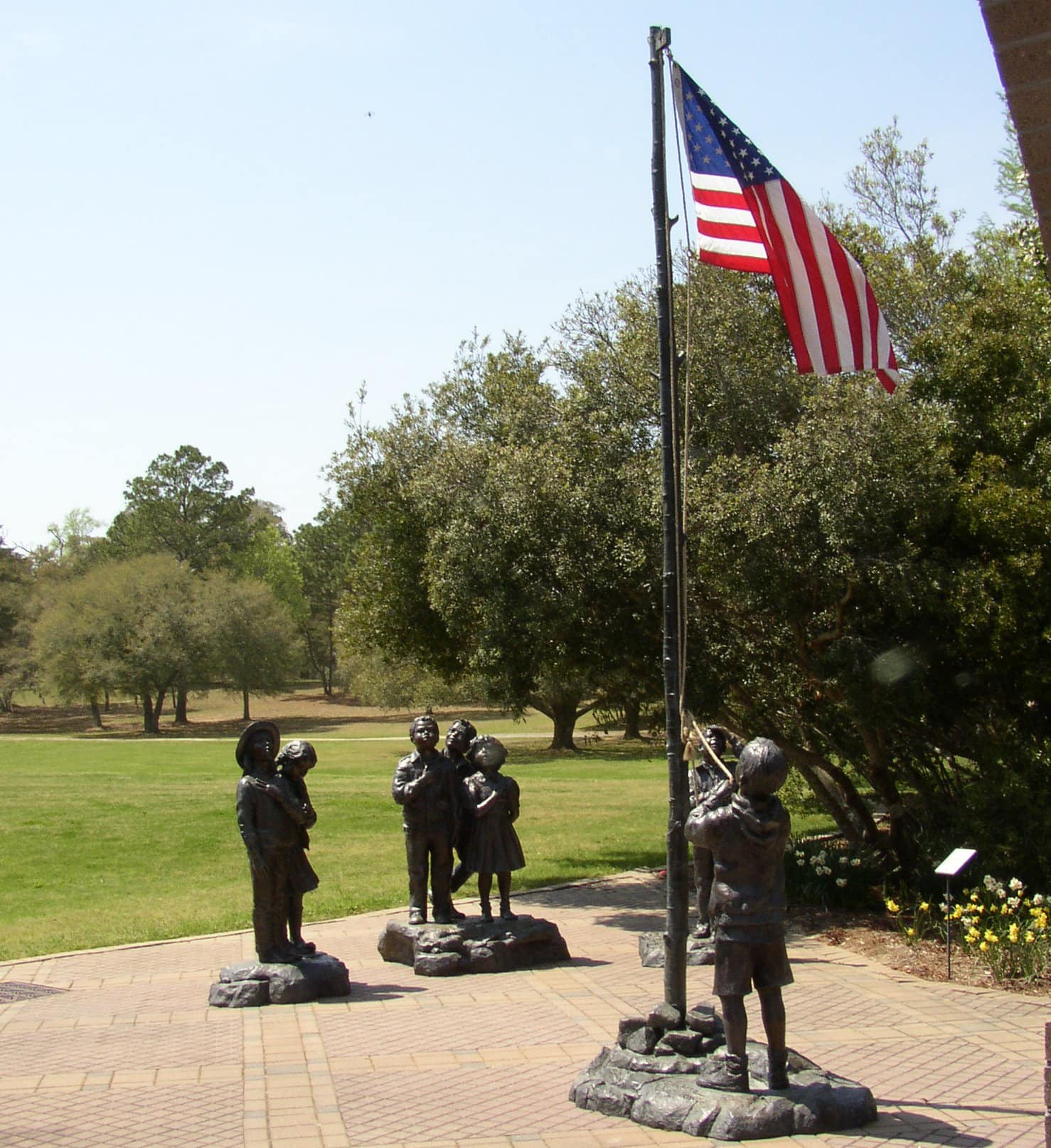 Kids at Flag statue - Brookgreen, South Carolina