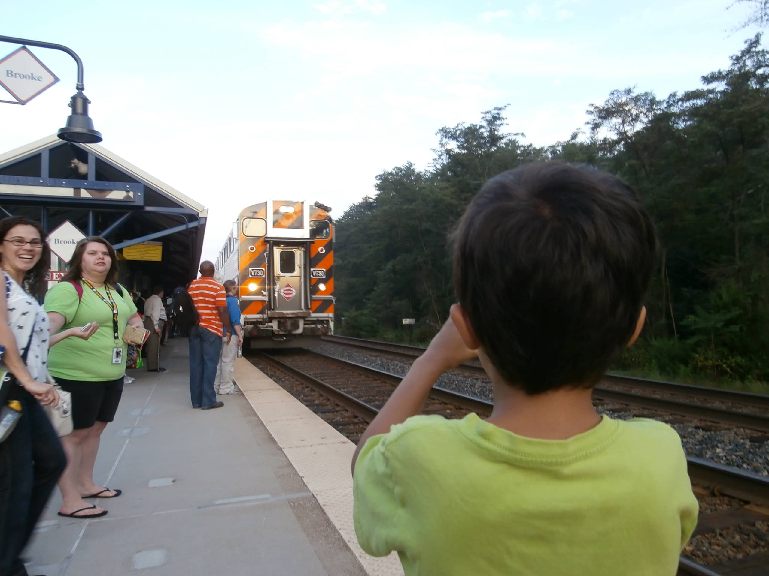 Grandson taking a picture of incoming VRE train - Brooke Station, Fredericksburg, Virginia