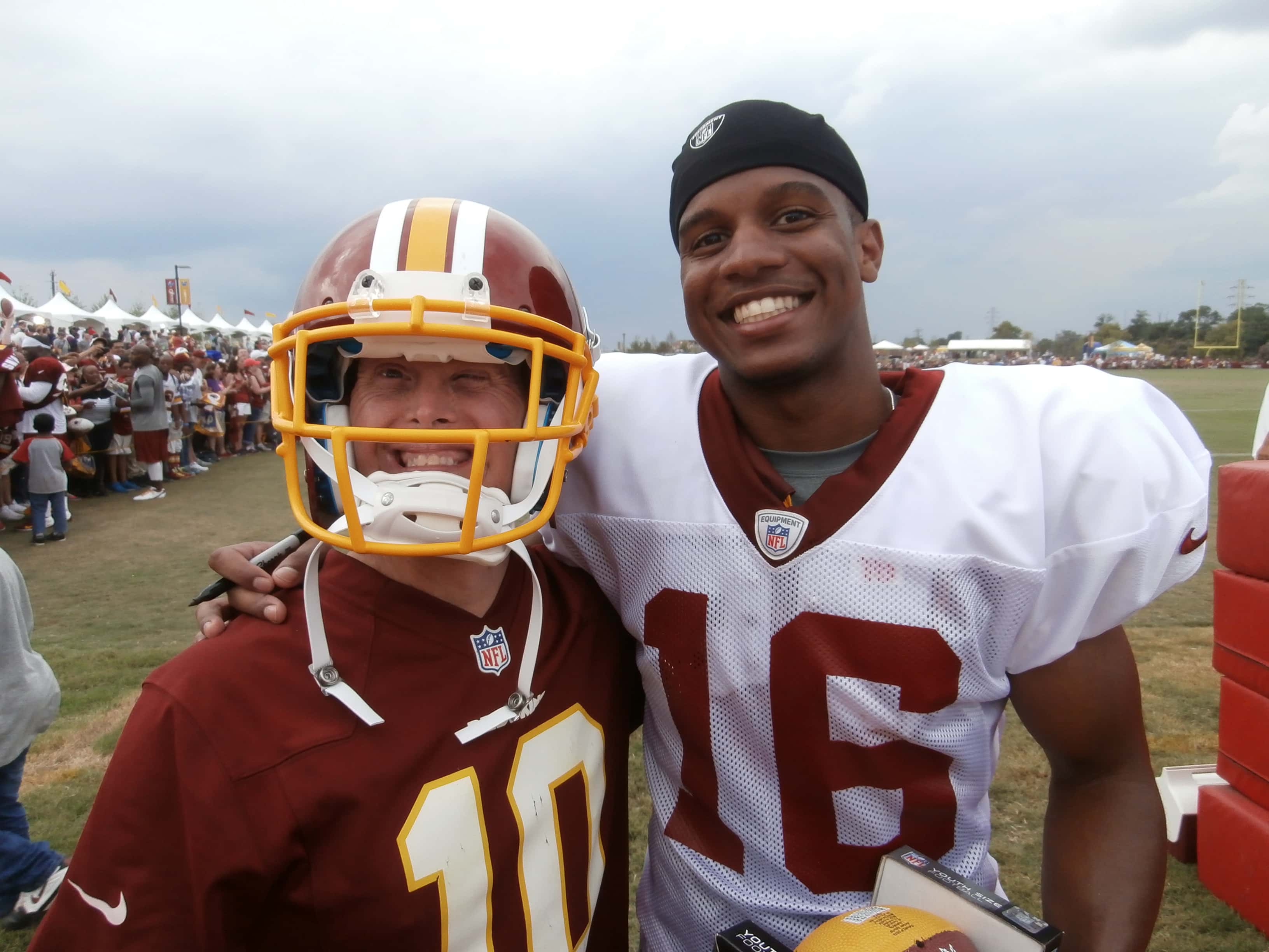 Chuck (in helmet) with a Washington Redskin - Redskin Training Camp, Richmond, Virginia 2013