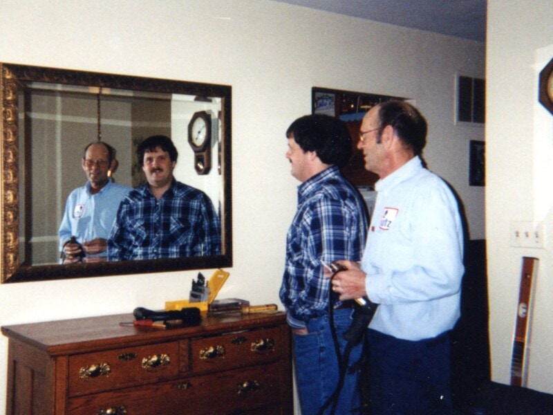 Dad and me and our reflections in the mirror