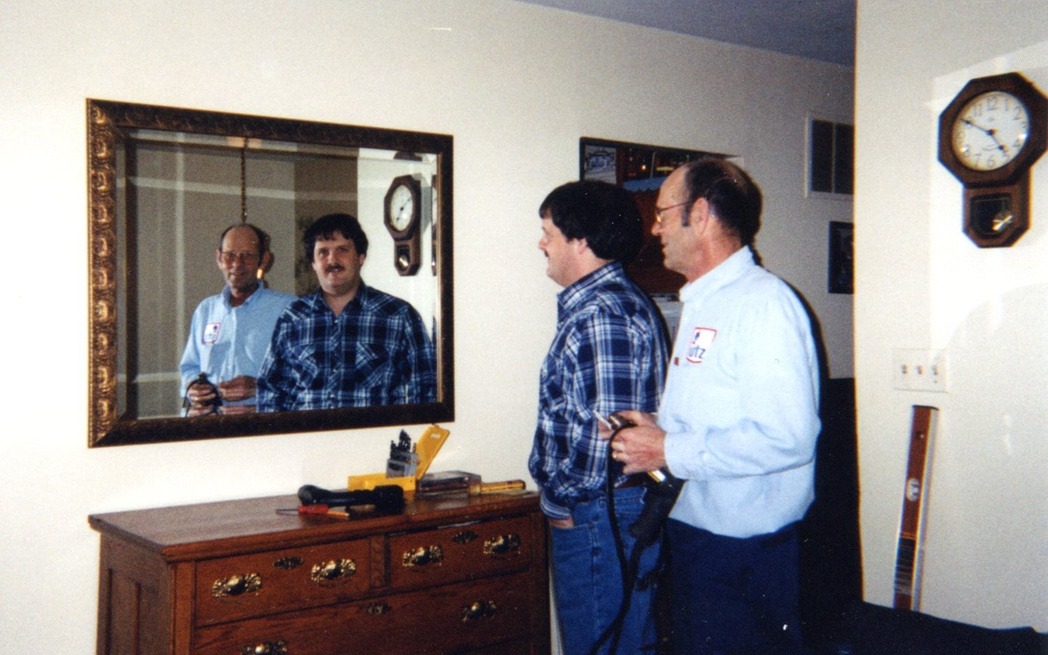 Dad and me and our reflections in the mirror